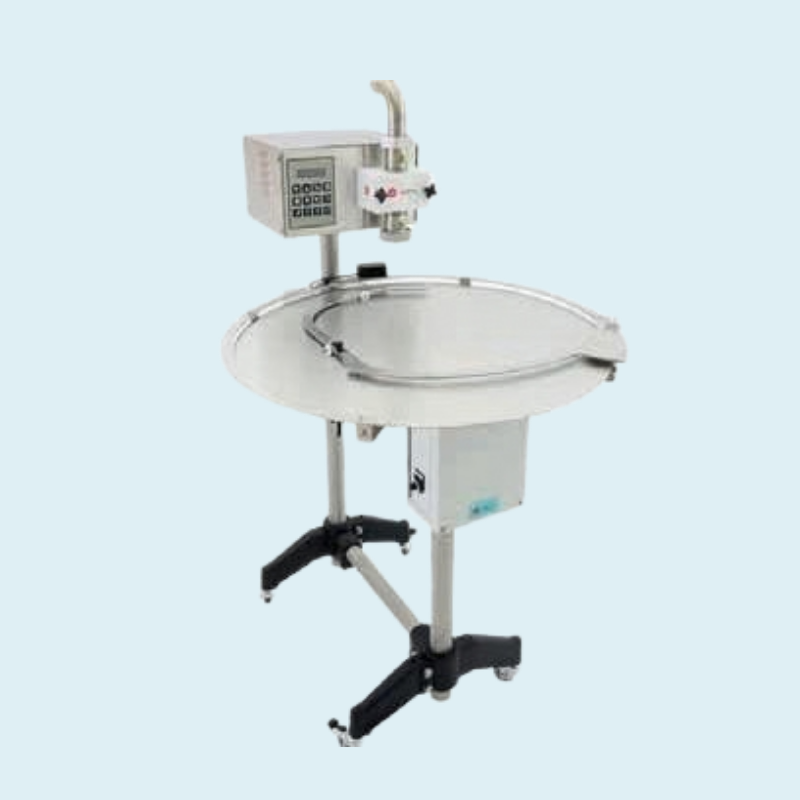 Dosatrice elettronica con tavolo mobile rotante Ø 70